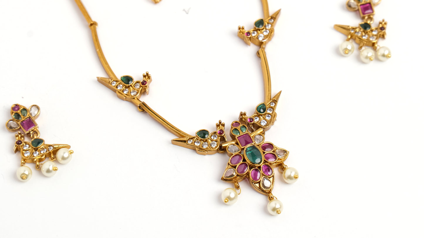 Elegant Gold Peacock Necklace Set with Pearl Hanging & Red-Green Stones